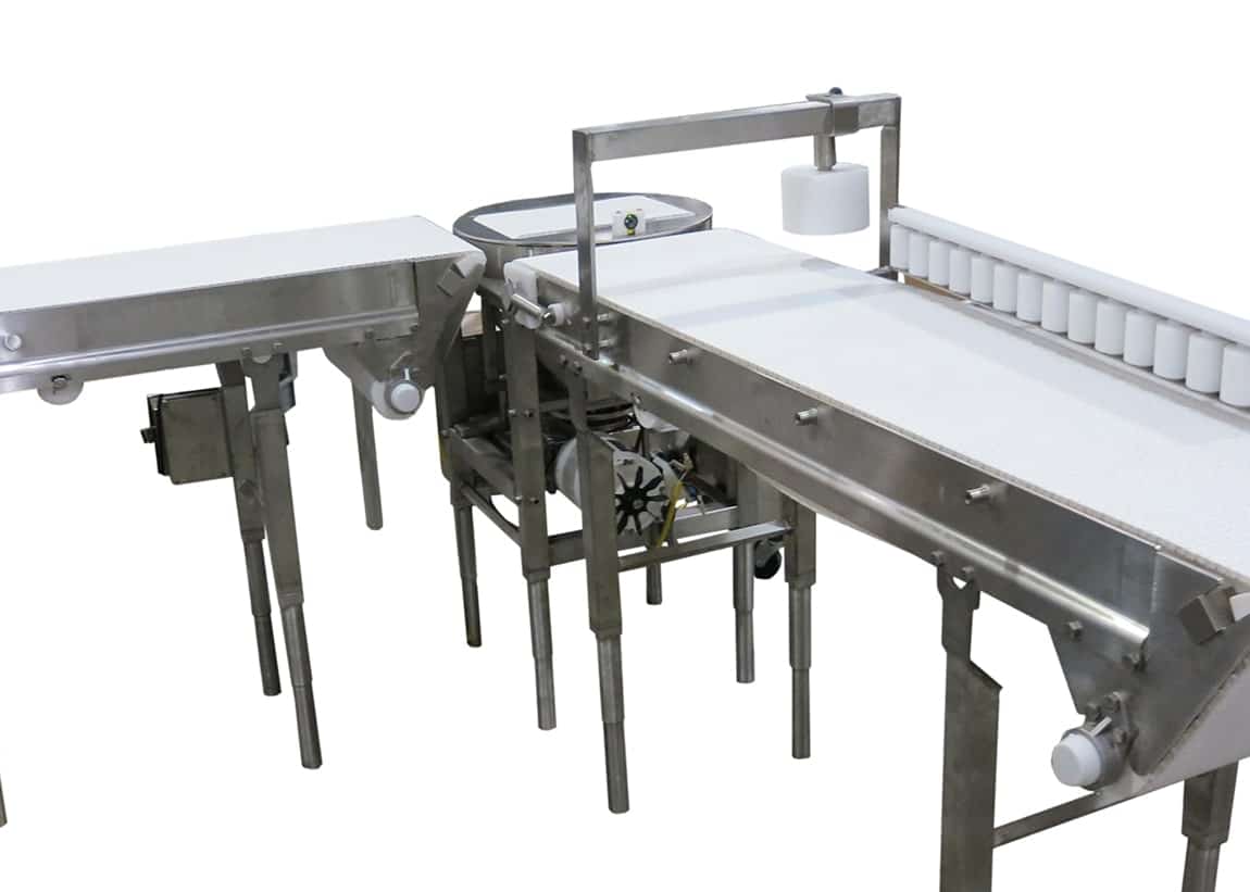Image of a Cheese Turner with a weigh station and bump turn.